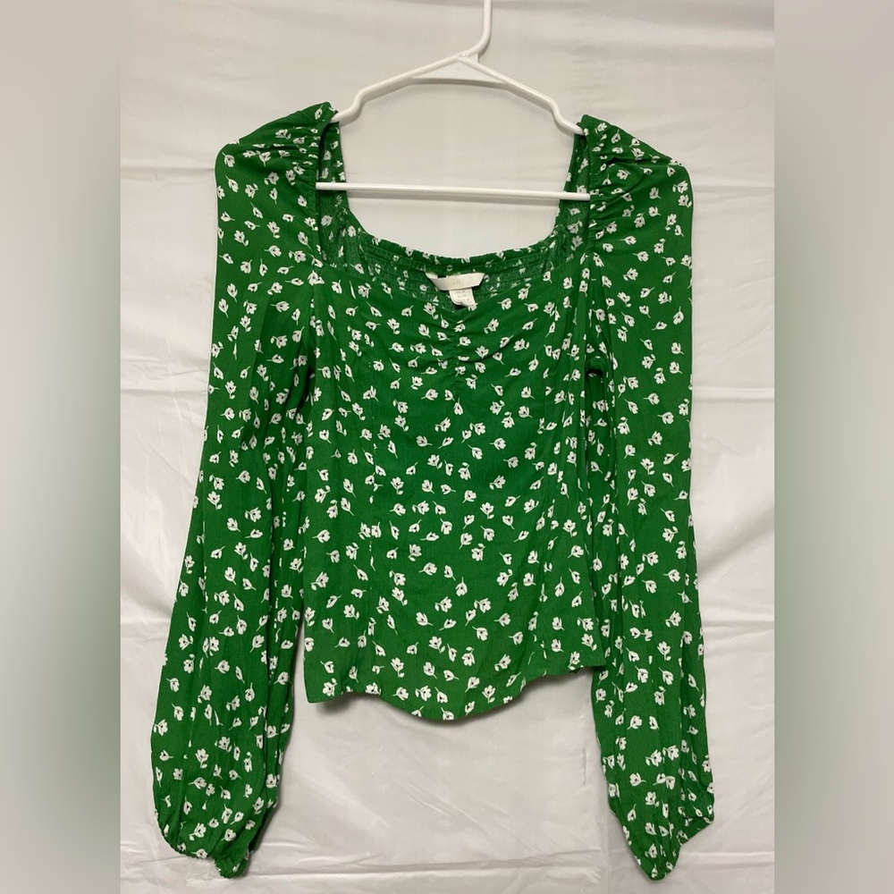 H&M Puff-sleeved Blouse  
Ruched down the bust.